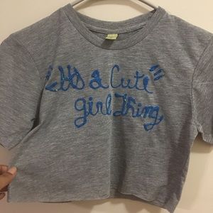 Cute girl hand painted and glittered cropped tee.